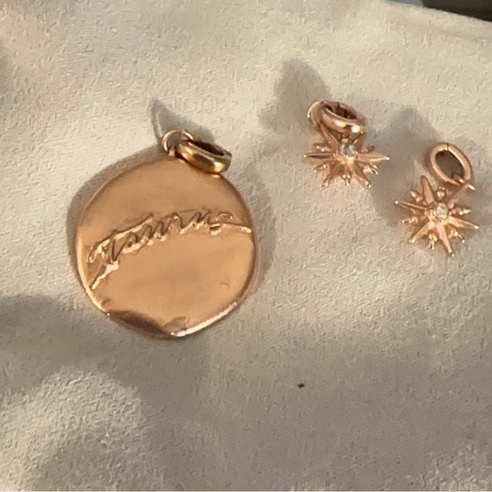3 Kendra Scott Charms in Rose Gold - 1 Taurus charm and 2 star charms $22
